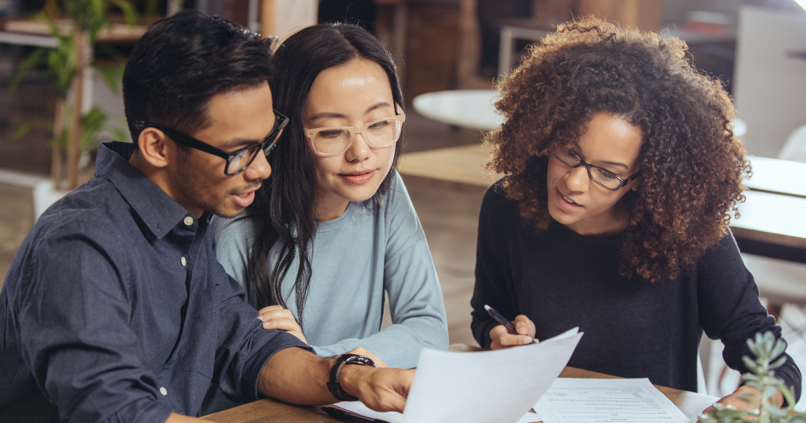 people discussing at a table